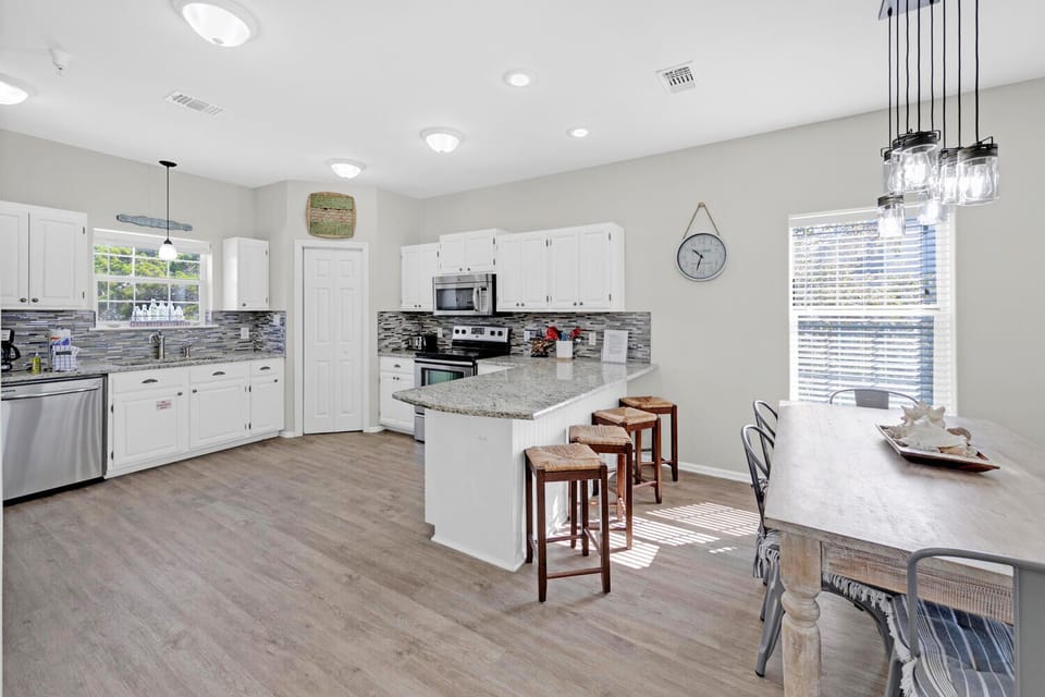Dining plus kitchen with eat-in bar seating