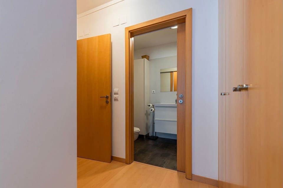 Step into a private bathroom designed for your comfort, featuring a modern vanity and ample space for your toiletries, offering a refreshing start to your day or a relaxing evening routine. The clean and bright design ensures a tranquil personal space. #P