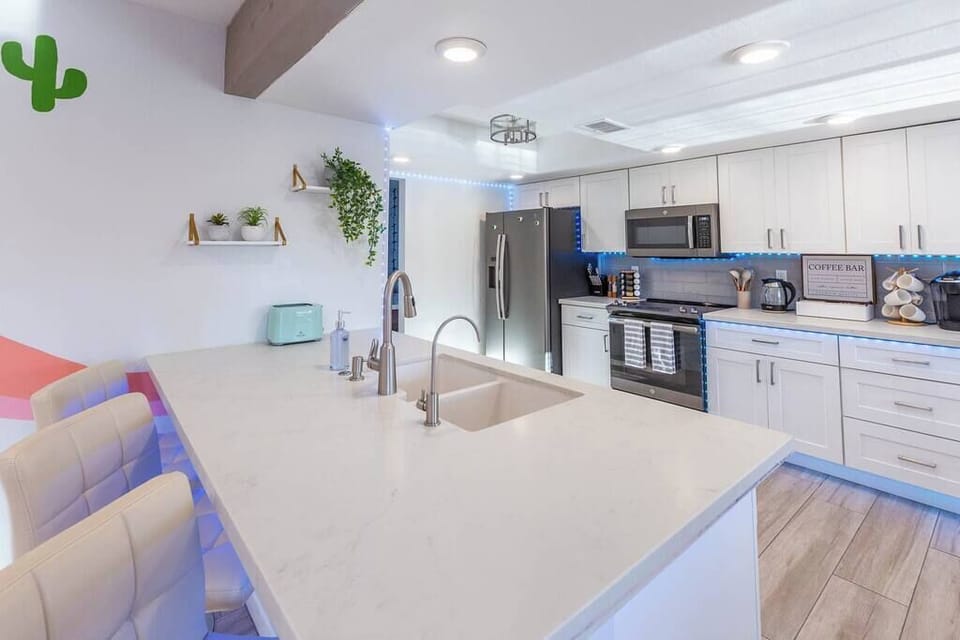 Step into our spacious kitchen, the epicenter of culinary magic. Unleash your creativity with a kitchen island designed for three, where every seat is a front-row ticket to gastronomic excellence.
