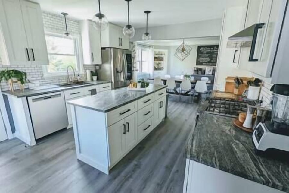 Fully stocked kitchen with utensils, dishes, cookware, etc. 