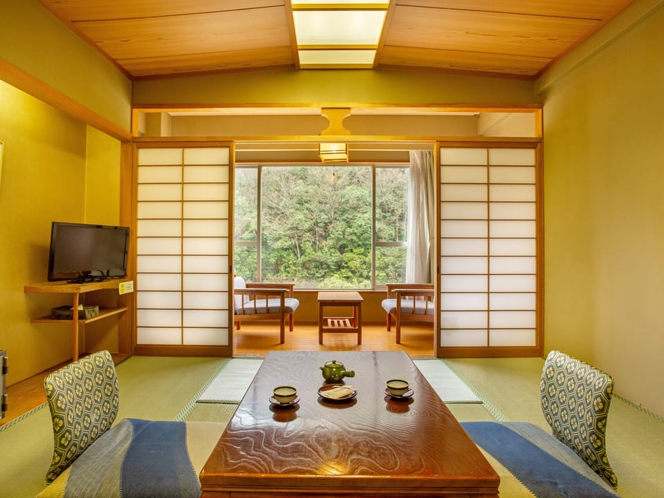 Japanese Style Room with Hot Spring Bath, River View | In-room safe, WiFi (free), bed sheets