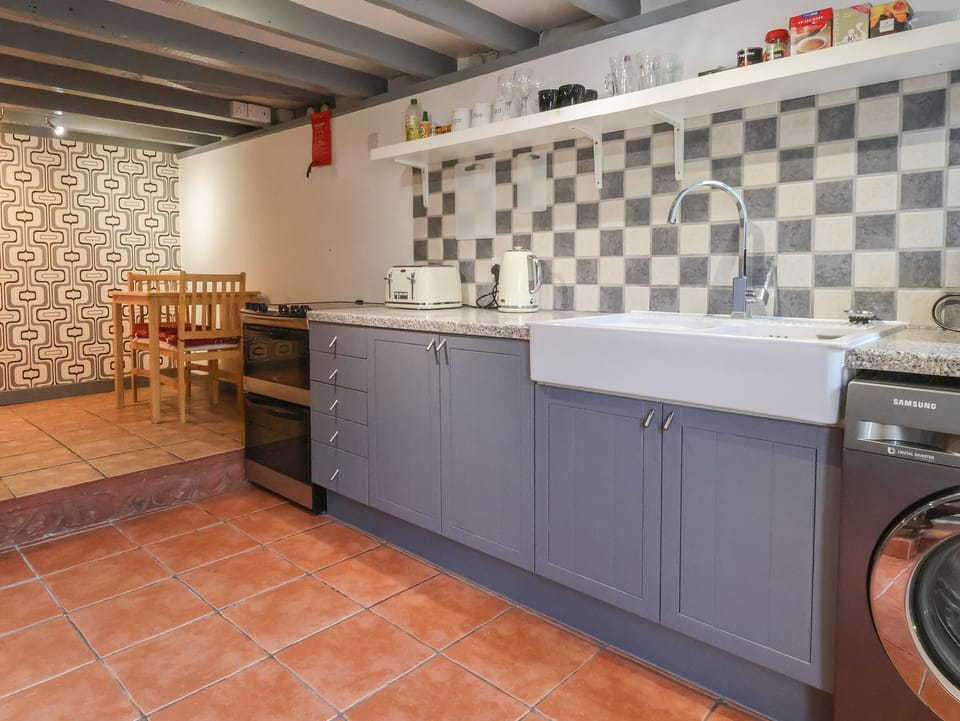 Fridge, electric kettle, toaster, cookware/dishes/utensils