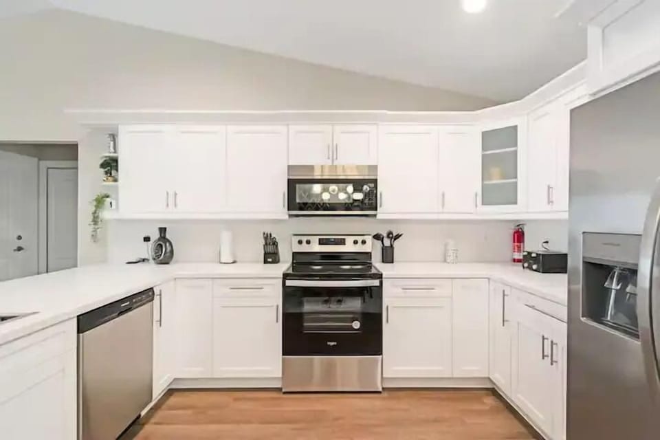 stove, oven, microwave, toaster, coffee maker, refrigerator
