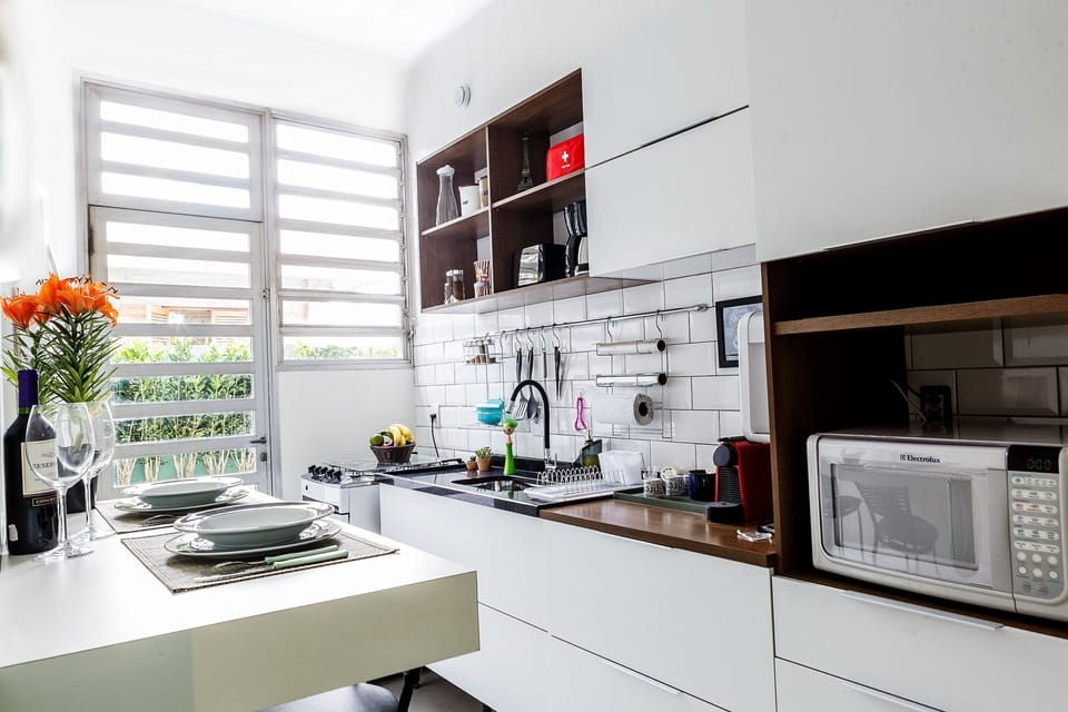 Villa | Private kitchen | Fridge, microwave, blender, cookware/dishes/utensils