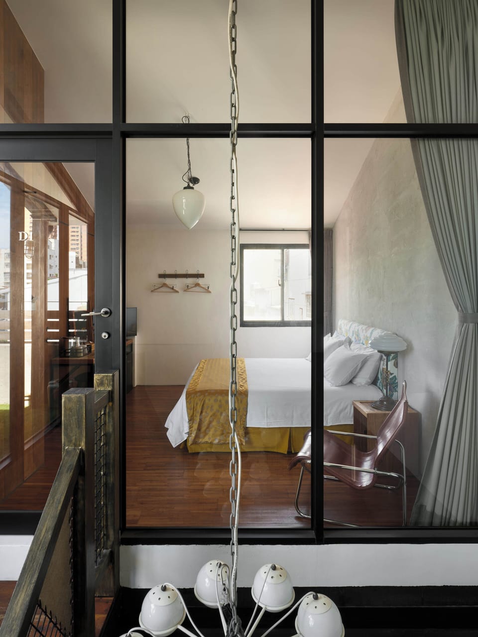Deluxe Double Room | Living area | 60-cm TV with cable channels, books