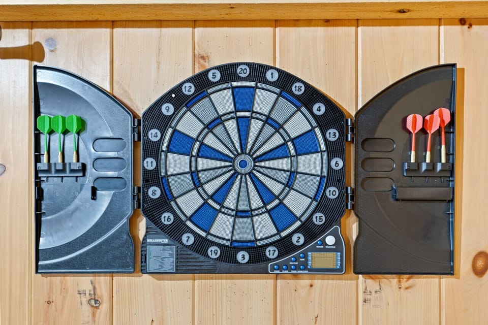 Ready, aim, score! Test your accuracy at our classic darts board.