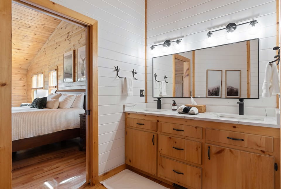 Spa like bathroom in master bedroom provides plenty space for getting ready to explore Blue Ridge. 