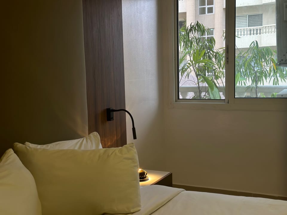 Standard Suite, 1 King Bed, Lagoon View, Garden Area | Premium bedding, individually decorated, individually furnished, desk