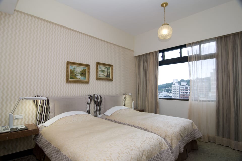 Twin Room, 2 Twin Beds | In-room safe, desk, blackout drapes