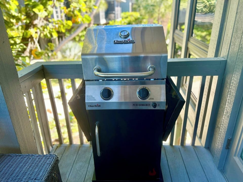 Gas grill on living room balcony 