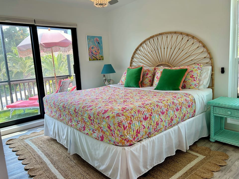 Primary Bedroom with King Bed and screened in Lanai