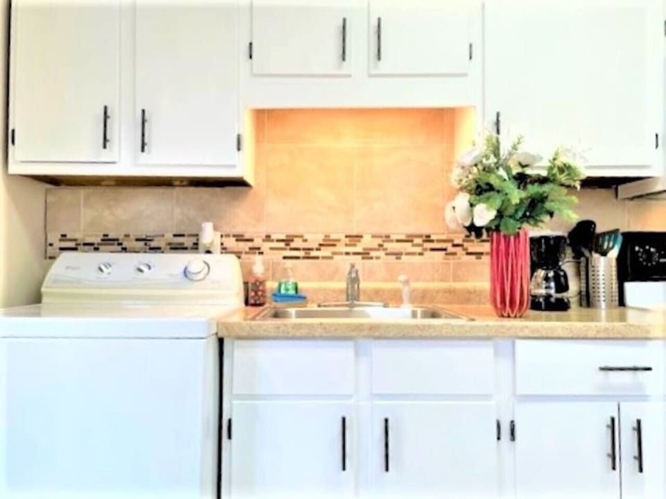 Kitchen with washer/dryer