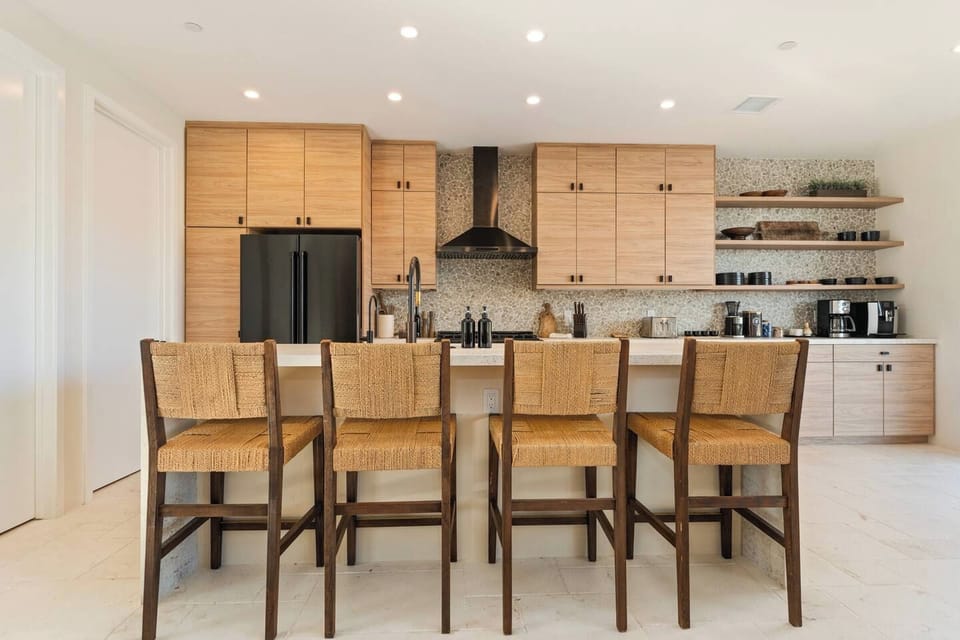 Serving up drinks or complete meals this kitchen setup is our favorite hang-out spot, grab a chair.