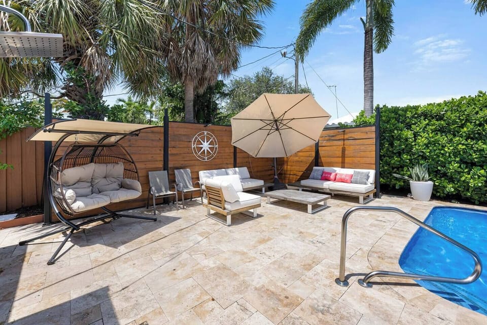Swing by the pool in our ourdoor egg-shell hammock!