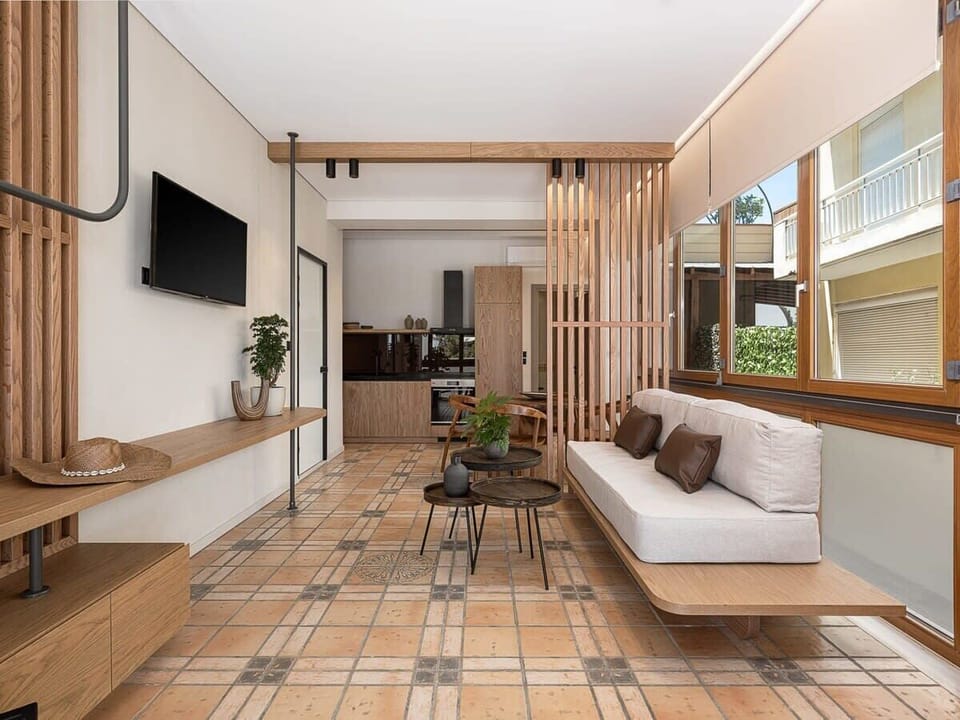 Modern and bright living room with smar Tv.