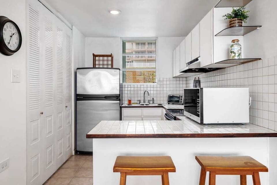 The simple but fully equipped kitchen at Faro Penthouse