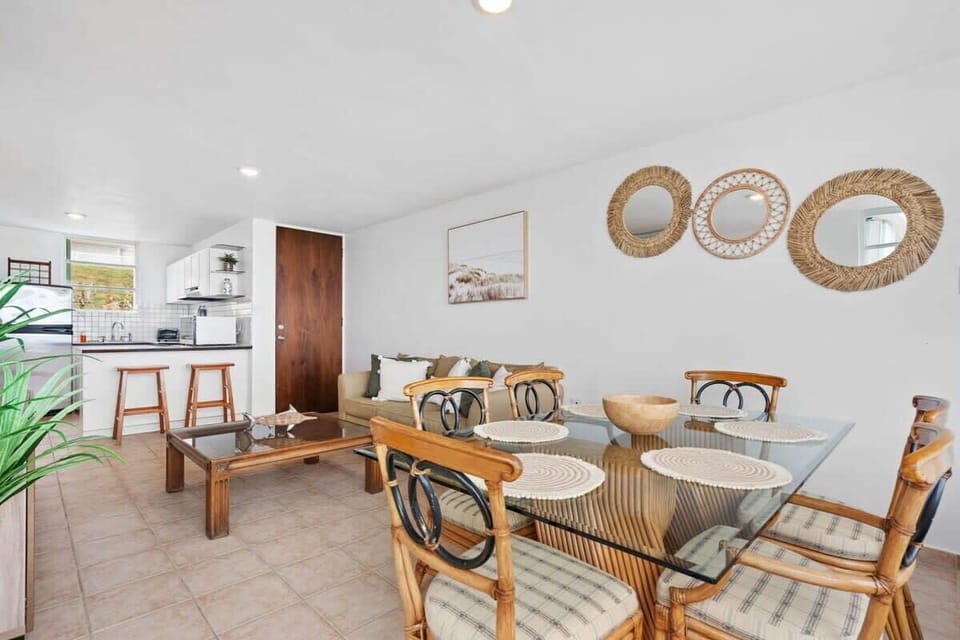 The open space living area seamlessly connects the kitchen, living room and the dining area.