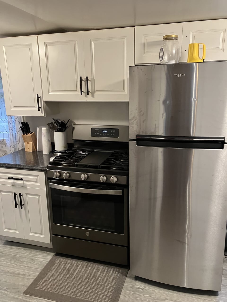 Gas range, refrigerator freezer, fully stocked kitchen