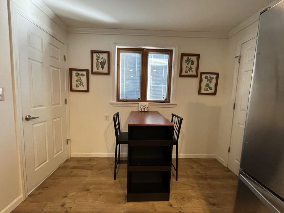 Kitchen
door to half bath on left
door to extra room and basement on right