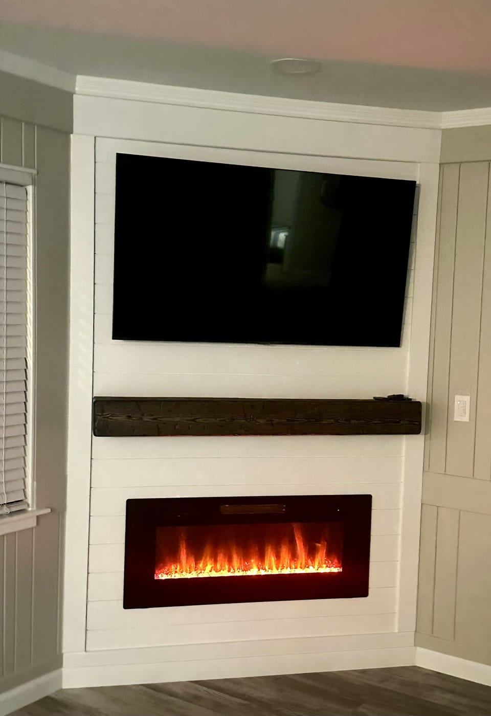 Electric fireplace with multi flame color options as well as heat.