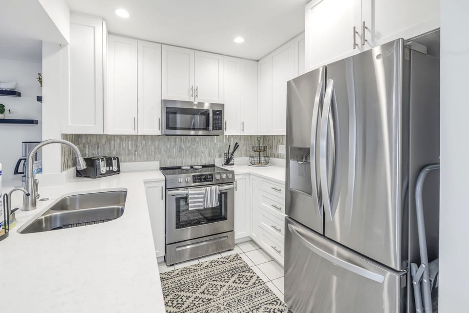 Plenty of counter space and full-sized fridge.