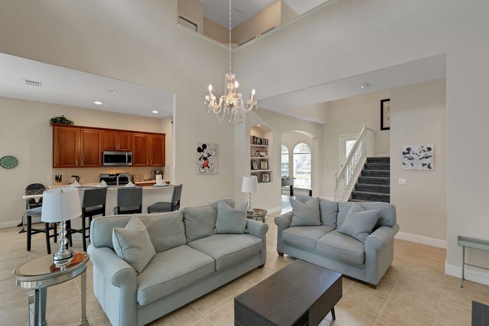 Relax in the comfortable open concept living area featuring plush seating, a large flat-screen TV, and high-speed Wi-Fi—perfect for movie nights, streaming, or unwinding after a day of adventure.  Enjoy a game at the fooseball table with your family.