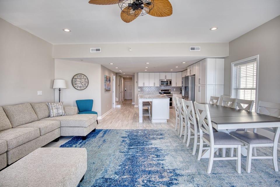 Living Room and Dining Room Table with Ocean Front view