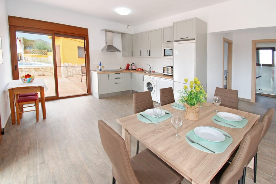 You will find large window doors opening onto the terrace.