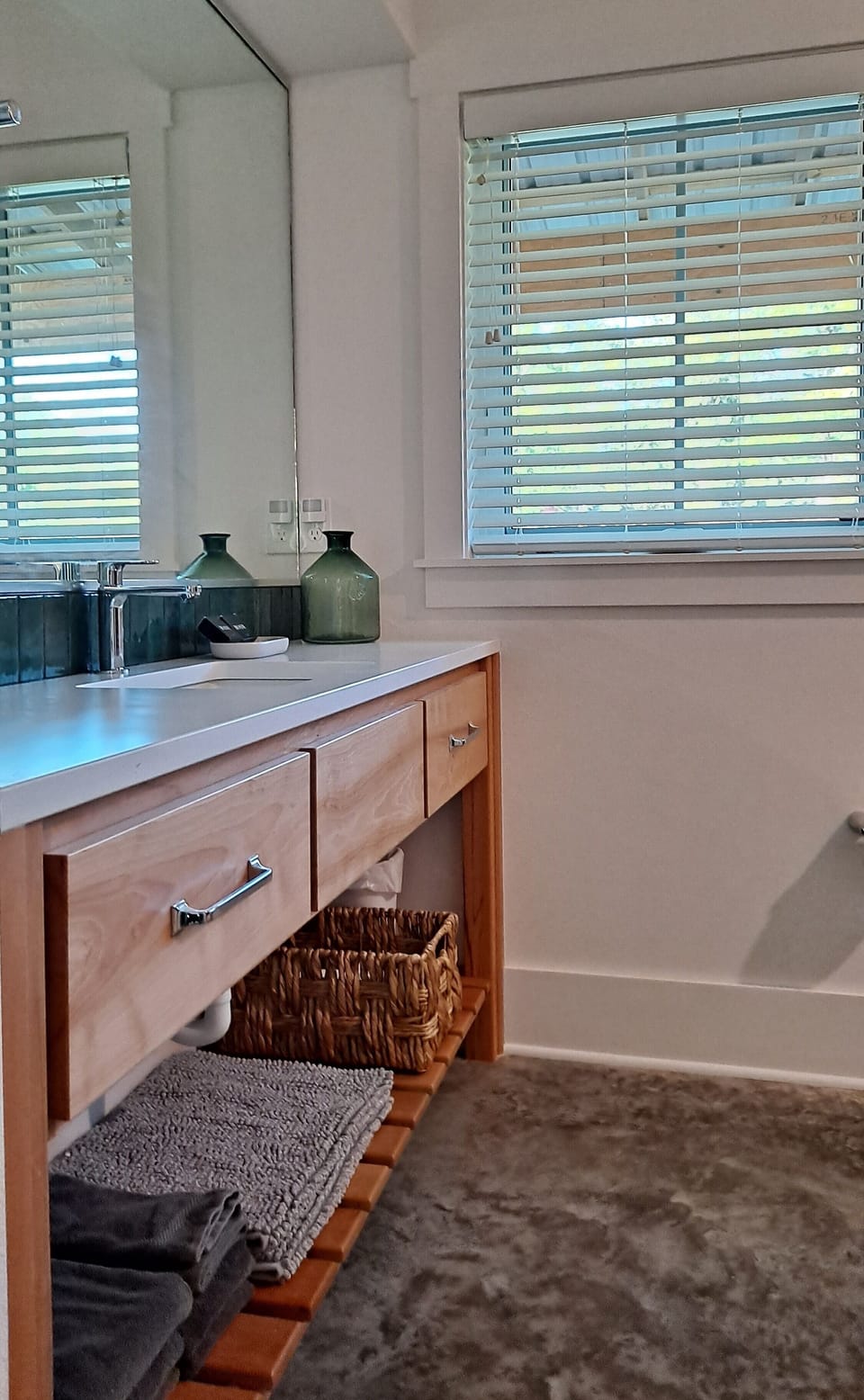 Wide bathroom counters with deep drawers for all your stuff.