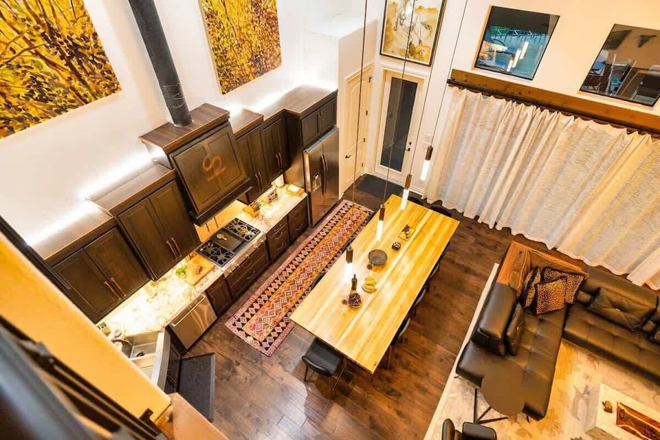 View from the stairs overlooking the kitchen area 