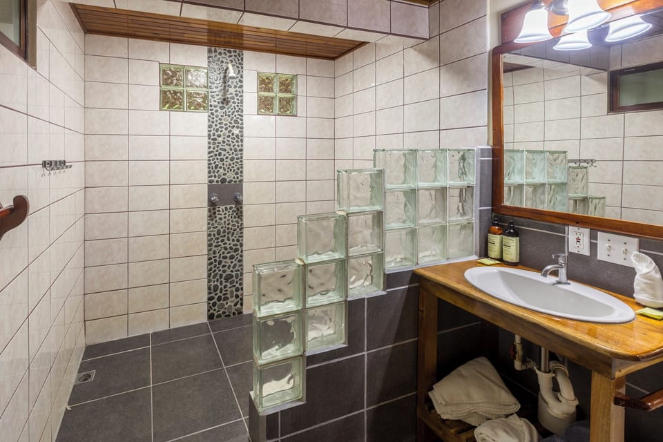 Villa, Multiple Beds, Kitchenette | Bathroom | Shower, towels, soap, shampoo