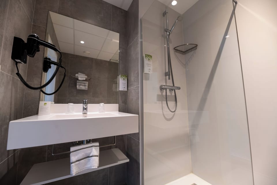 Panoramic Room, 1 King Bed | Bathroom | Combined shower/tub, hair dryer, towels, soap