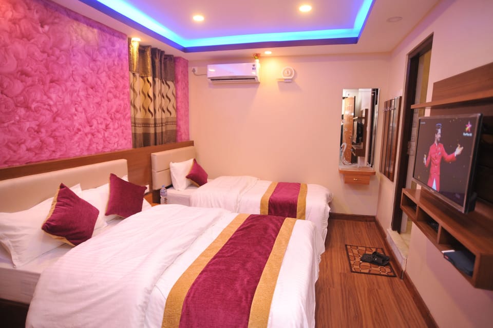 Deluxe Triple Room | Hypo-allergenic bedding, minibar, in-room safe, individually decorated
