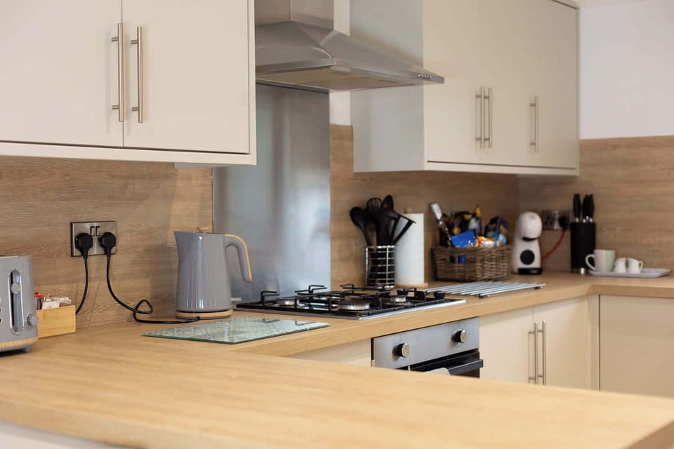 Sleek kitchen with all you need for cooking up family meals or holiday treats.