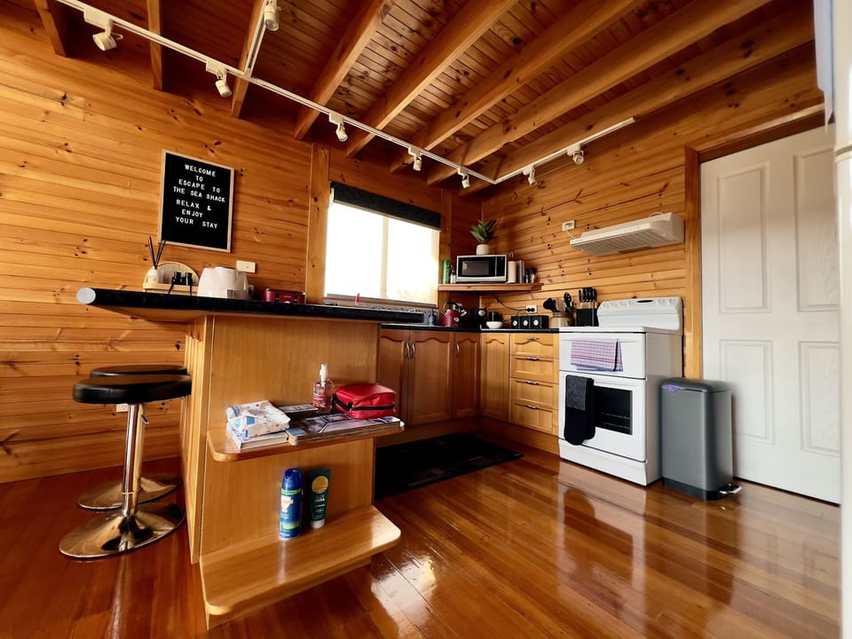 Full Kitchen with Oven, stove, microwave and air fryer.