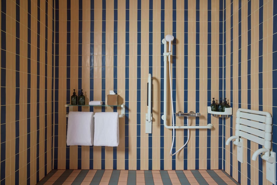Room (Sir Supreme) | Bathroom | Designer toiletries, hair dryer, bathrobes, towels