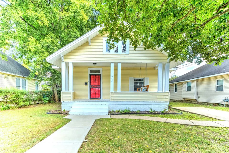 historic Memphis home with beautiful front porch and swing
