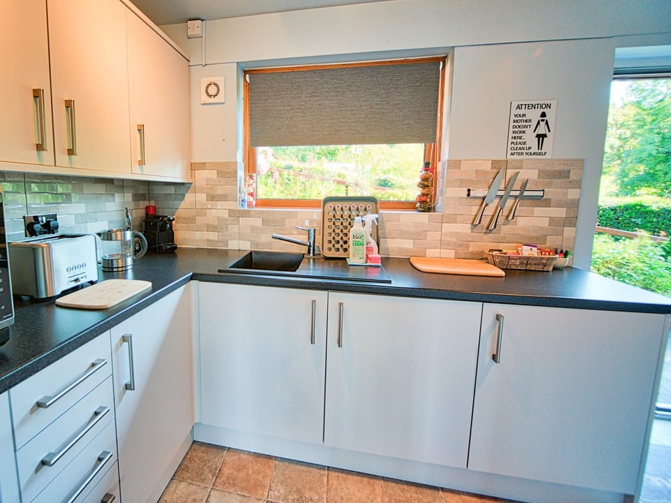 Fridge, electric kettle, toaster, cookware/dishes/utensils