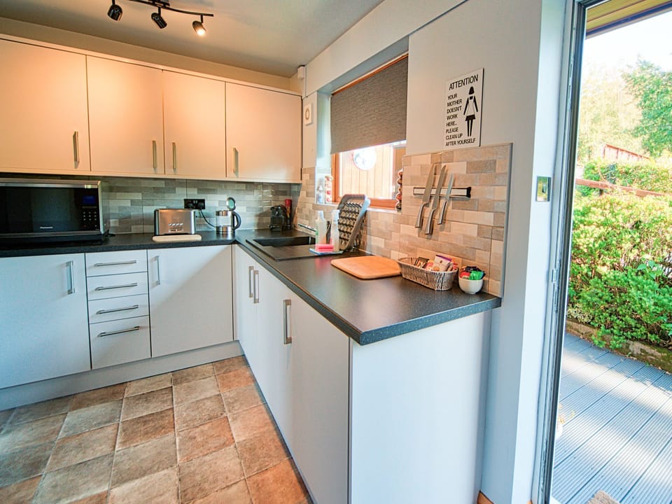 Fridge, electric kettle, toaster, cookware/dishes/utensils