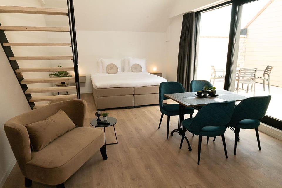 Luxury Quadruple Room | Down comforters, memory foam beds, soundproofing, free WiFi