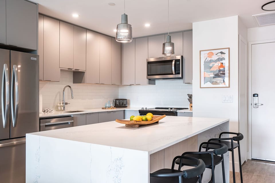 Condo | Private kitchen | Coffee/tea maker, full-size fridge, microwave, oven