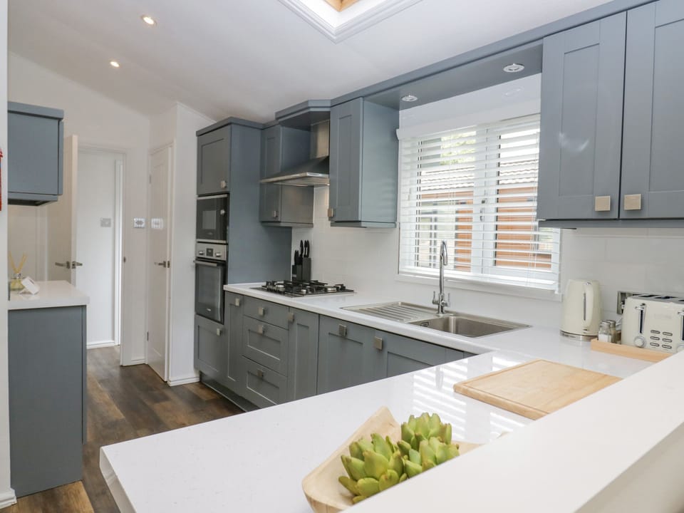 Fridge, electric kettle, toaster, cookware/dishes/utensils