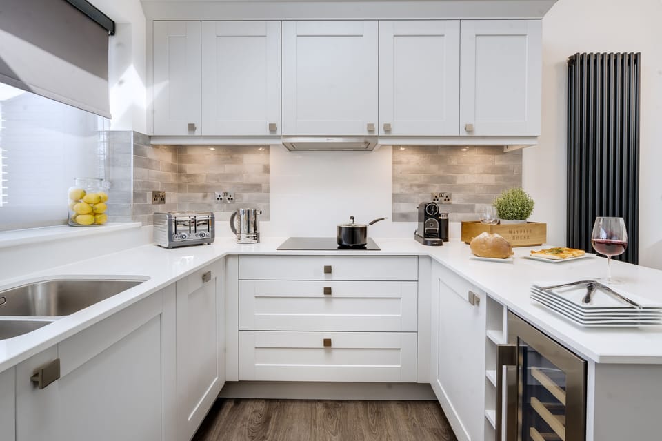 Stylish Kitchen & Breakfast bar complete with Wine Cooler