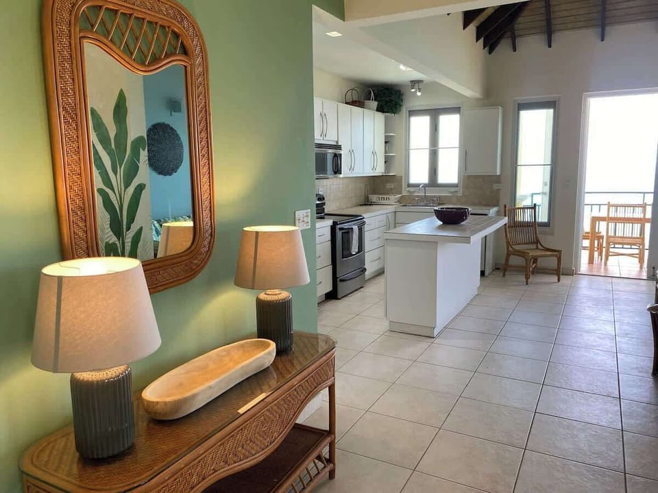 View of the Villa as you enter with kitchen in background.