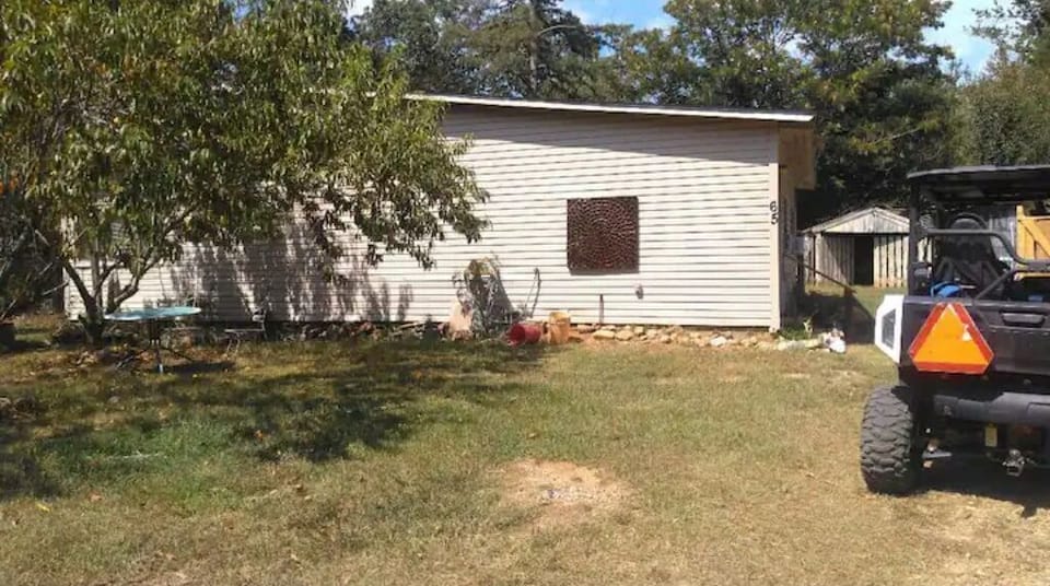 As you arrive, back door. 