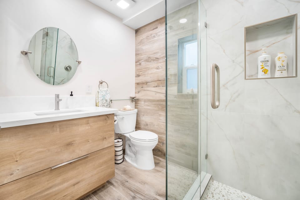 Bathroom that is off the living space and direct door to the main bedroom. 