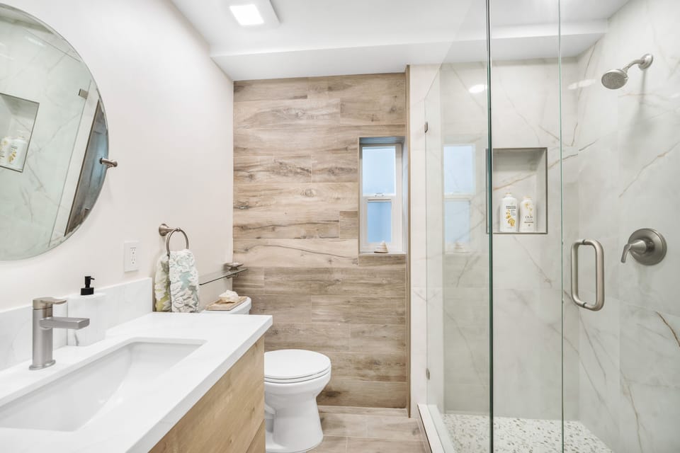 Bathroom that is off the living space and direct door to the main bedroom. 