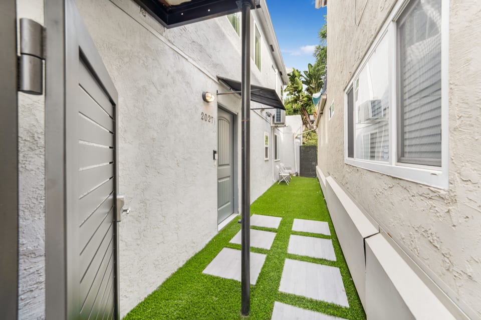Private fenced in entryway and patio.  