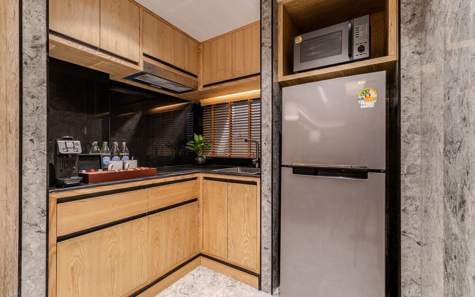 Family Room, 2 Bedrooms | Private kitchen | Coffee/tea maker