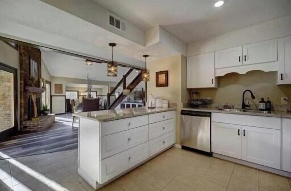  Bright, modern kitchen with stylish fixtures and open layout—perfect for culinary adventures!